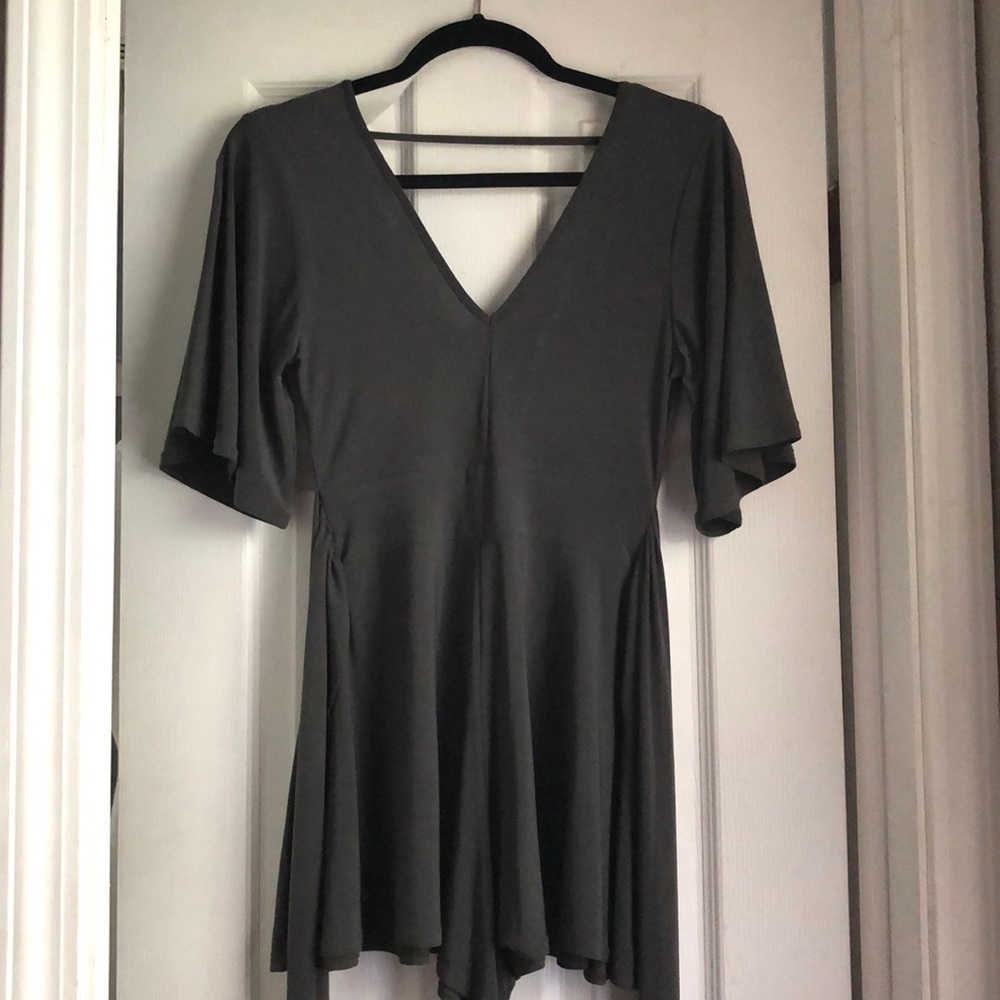 Olive green romper with open back and bow